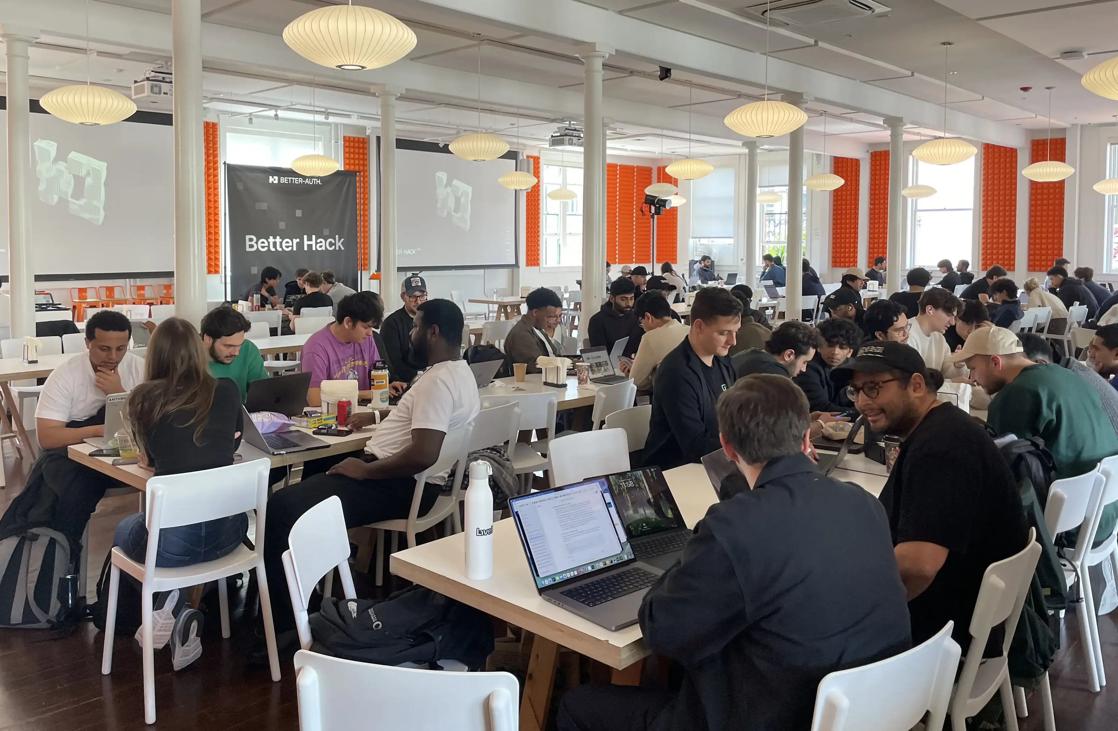 Developers coding at Better Hack at Y Combinator HQ